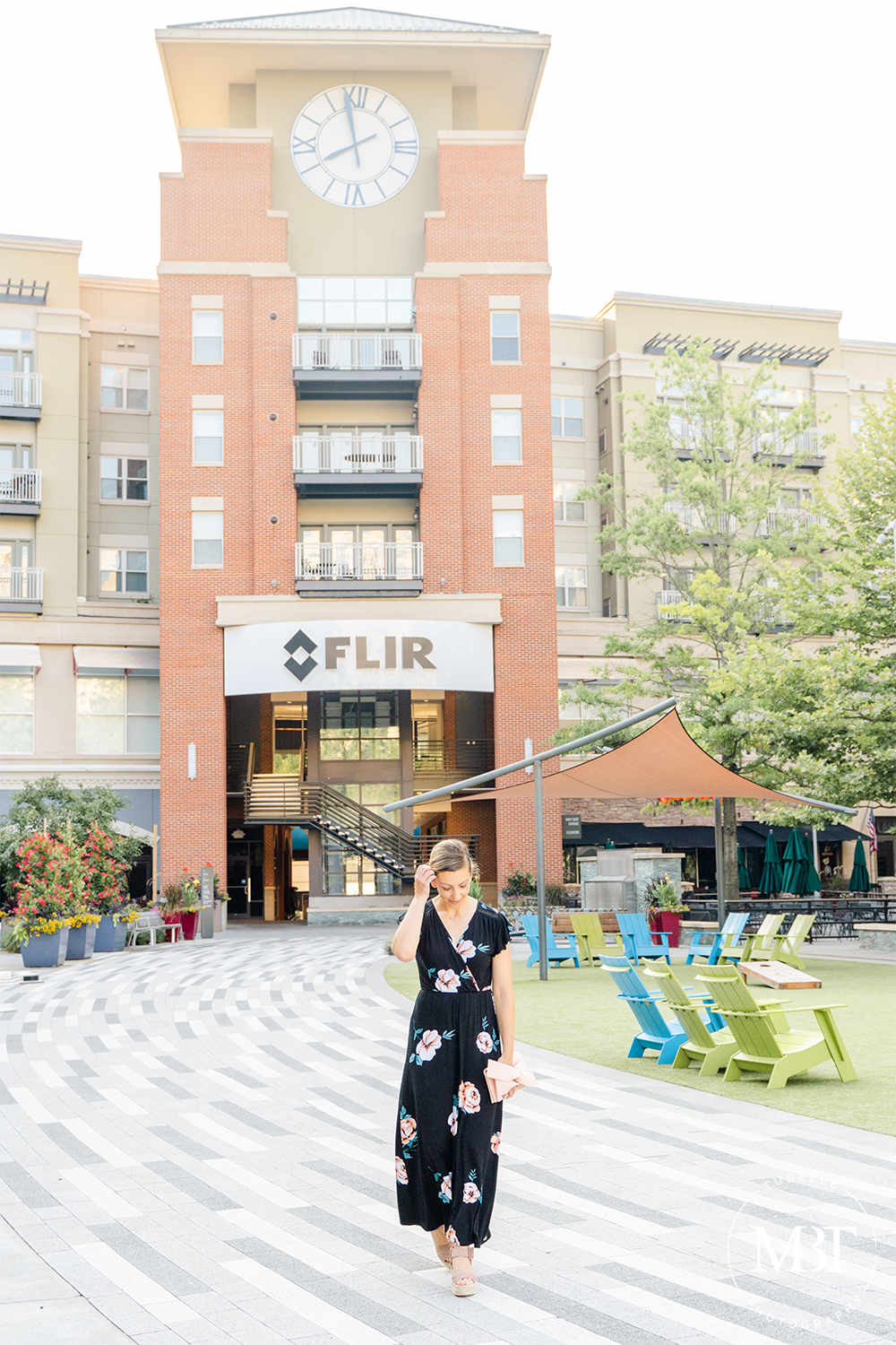woman wearing a floral maxi dress, lifestyle session taken in Arlington, Virginia by a branding photographer in Maryland