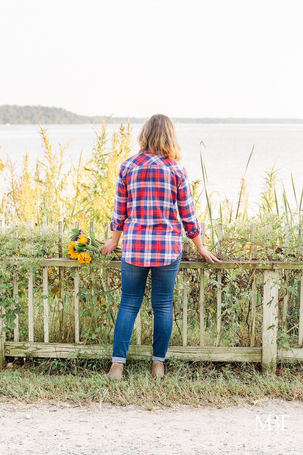 lifestyle session - fashion blogger looking over the Potomac River, taken in Alexandria, Virginia by a Washington, DC branding photographer