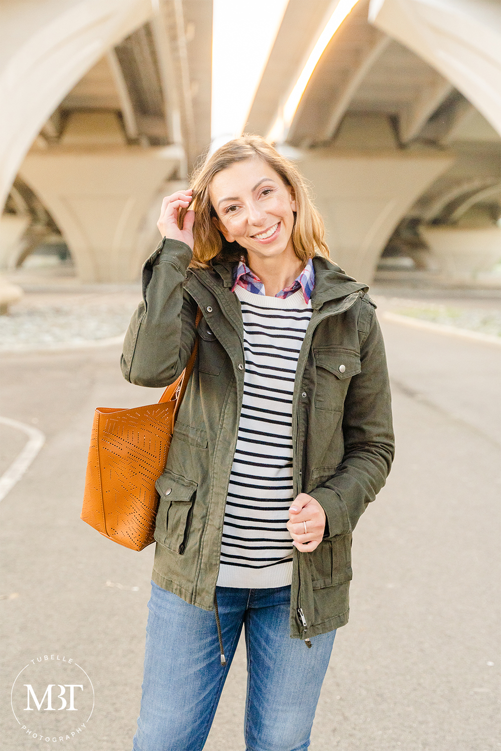 lifestyle session - fashion blogger wearing fall outfit, taken under the Woodrow Wilson Bridge at Jones Point Park by a Virginia lifestyle photographer