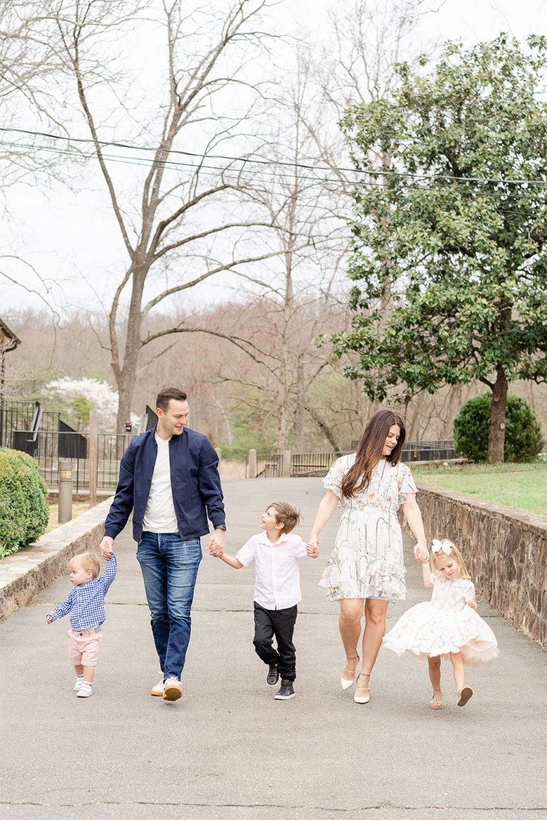 family walking during their family session in Gainesville, Virginia taken by a Prince William County photographer