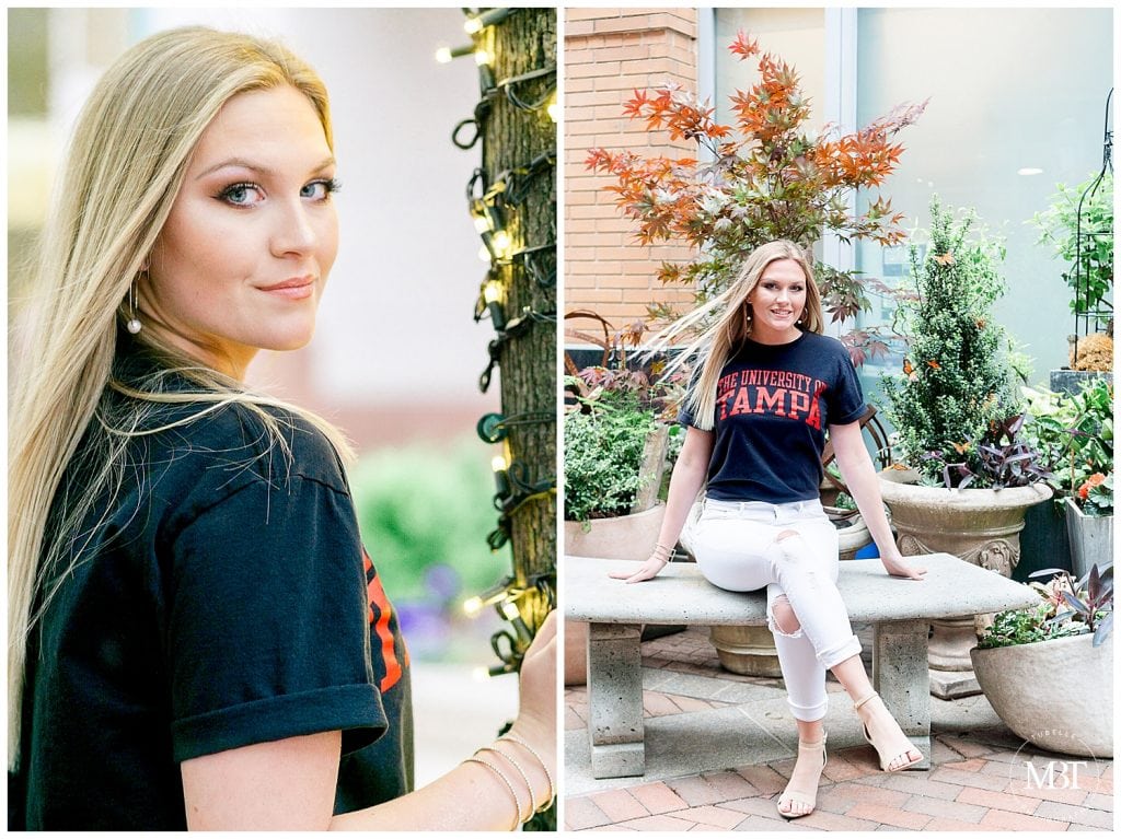 girl wearing University of Tampa tee during her senior session at Reston Town Center taken by a Northern Virginia senior photographer