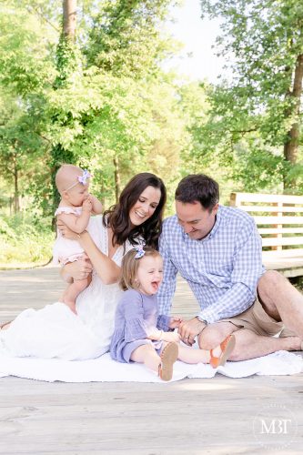 parents & kids playing during their family session at The Barn at One Loudoun in Ashburn, Virginia, taken by TuBelle Photography, a Northern Virginia family photographer