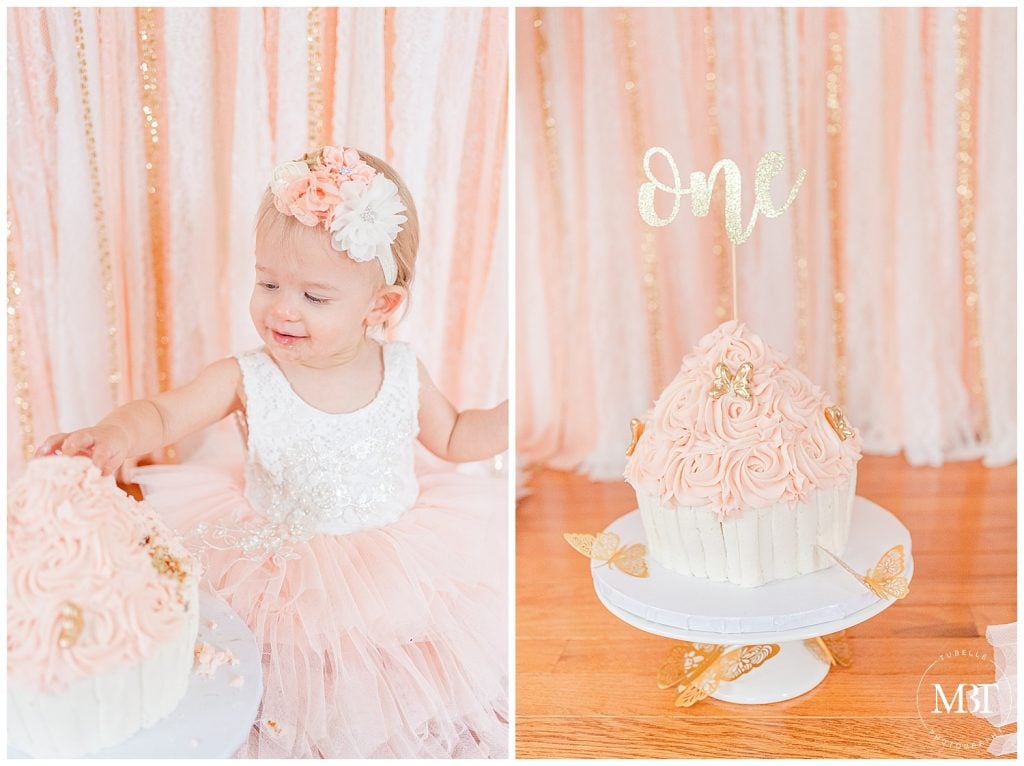 baby girl enjoying her cake smash pictures in Gainesville, Virginia by TuBelle Photography, a NoVa cake smash photographer