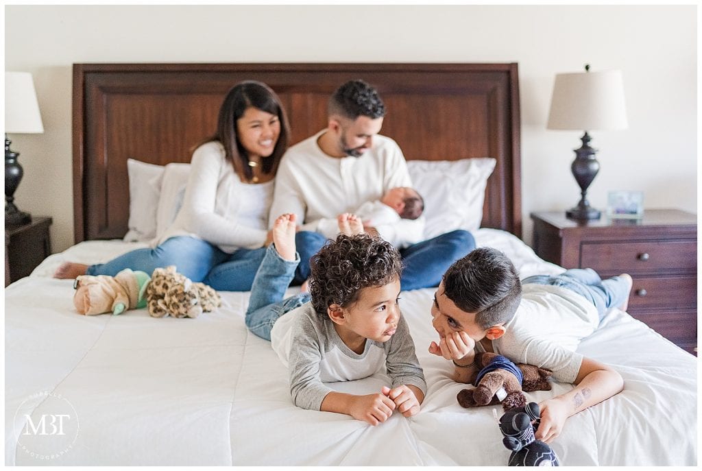 family of 5 during their in home newborn pictures in Gainesville, Virginia, taken by TuBelle Photography, a Northern Virginia newborn photographer