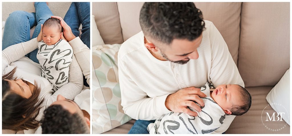 baby girl adored by his parents during their lifestyle newborn pictures, taken in Gainesville, Virginia by TuBelle Photography, a Prince William County newborn photographer