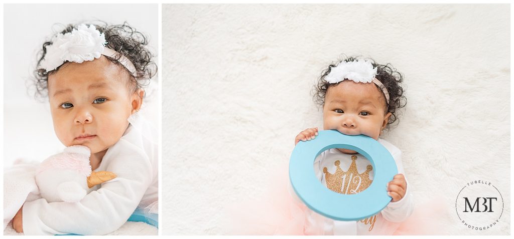 baby girl playing with a lovie and letter O during baby milestone pictures in Woodbridge, Virginia, taken by TuBelle Photography, a Northern Virginia milestone photographer