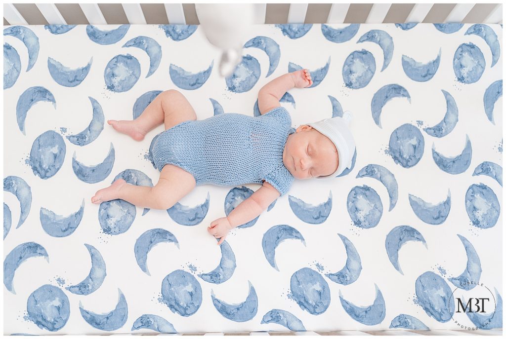 baby boy during his in home newborn photography taken in Bristow, Virginia taken by TuBelle Photography, a Northern Virginia newborn photographer
