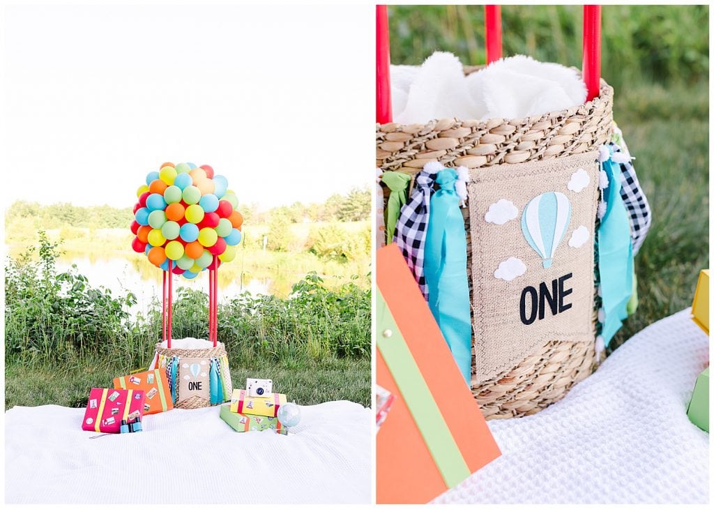 hot air balloon, luggages, camera, binoculars, and globe for time flies cake smash in Northern Virginia