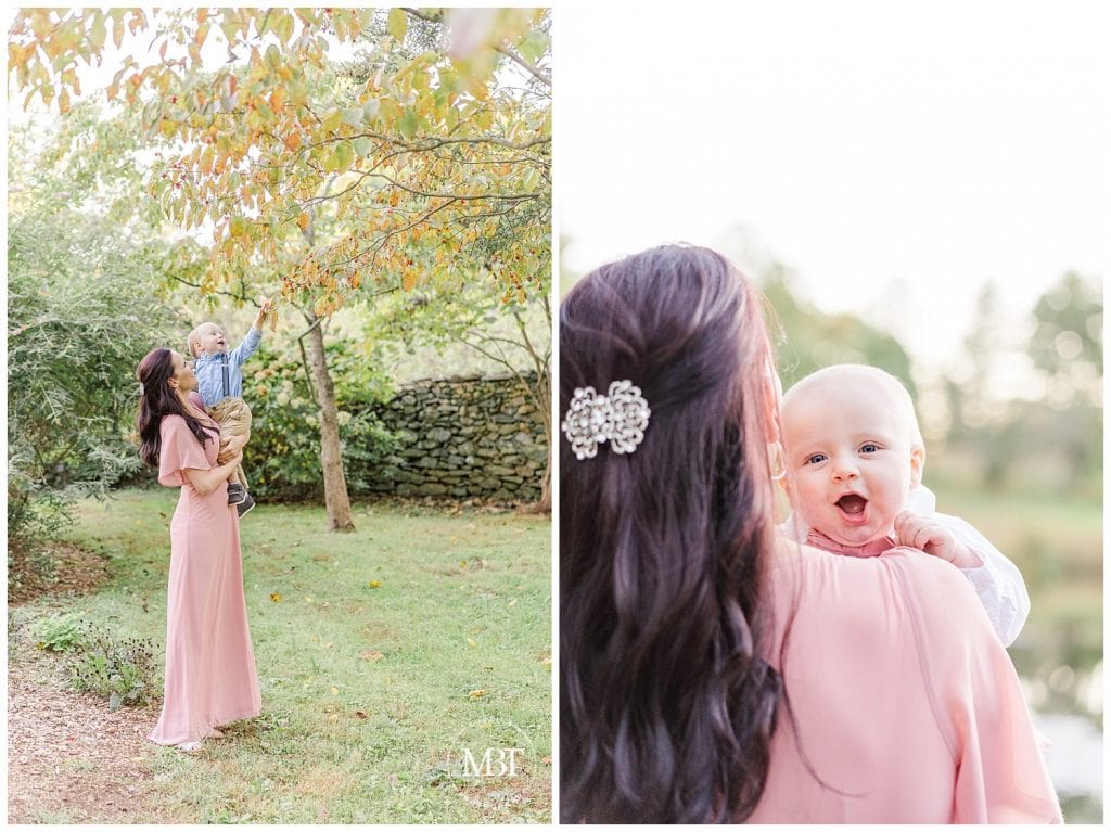 Mom holding son reaching for a tree branch at their fall family portraits in Warrenton, Virginia taken by TuBelle Photography, a NoVa Family Photographer.