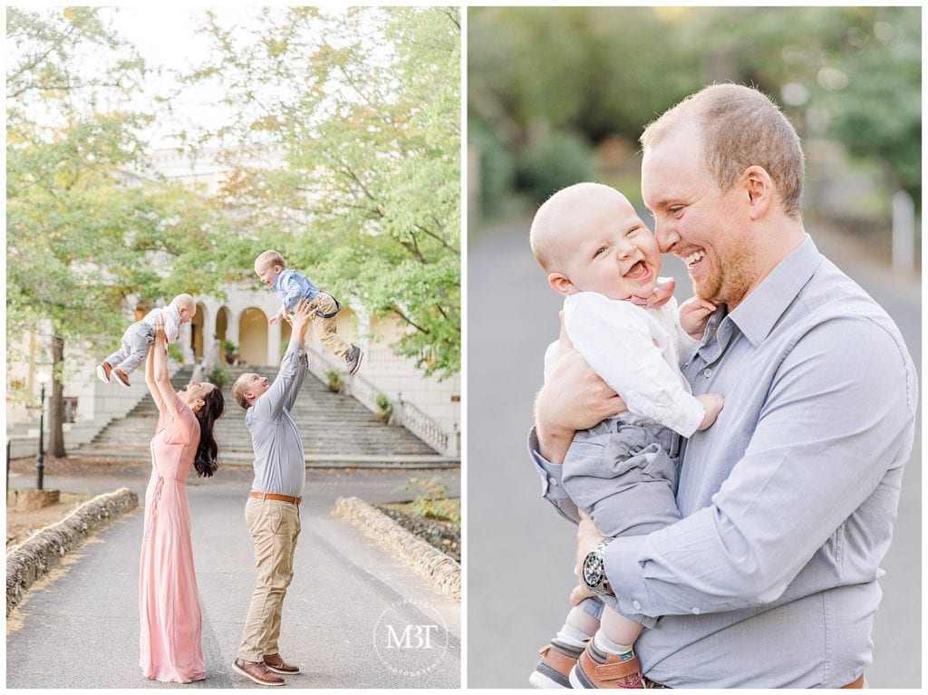 Dad holding baby smiling and mom and dad holding sons in the air at their fall family pictures in Prince William County, Virginia taken by TuBelle Photography, a Northern Virginia Family Photographer.